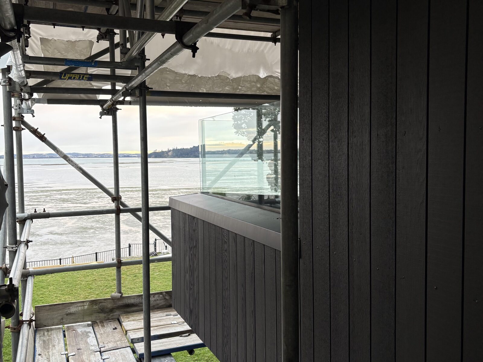 Waterfront deck and harbour view during the Westmere renovation
